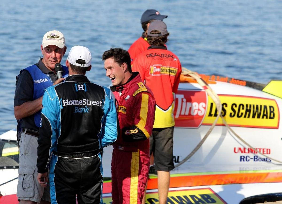Andrew Tate (right) and Jimmy Shane (center) do a radio interview with 610 KONA in the pits during the 2016 HAPO Columbia Cup.