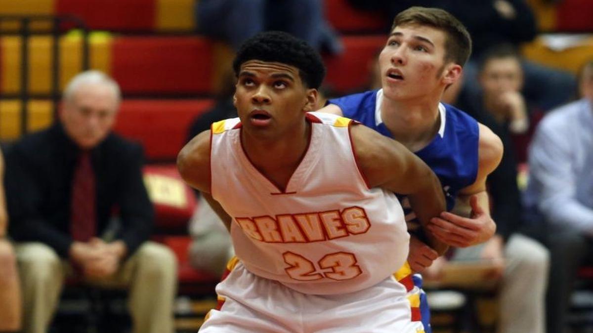 Isaiah Brimmer (23), playing against Walla Walla earlier this season, and the Kamiakin Braves will face Lincoln of Tacoma at 4 p.m. Saturday in a Class 3A boys state regional game.