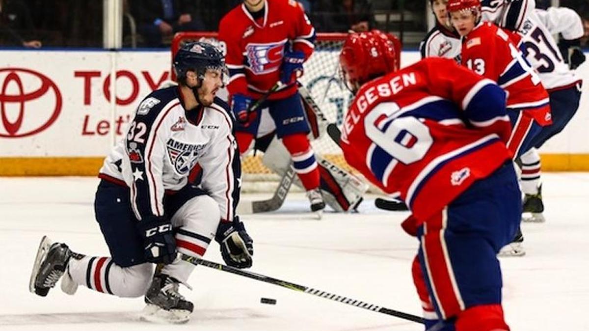 Tri-City’s Parker AuCoin (32) goes down to block a puck in the first period Sunday against Spokane. The Americans beat the Chiefs 4-3.