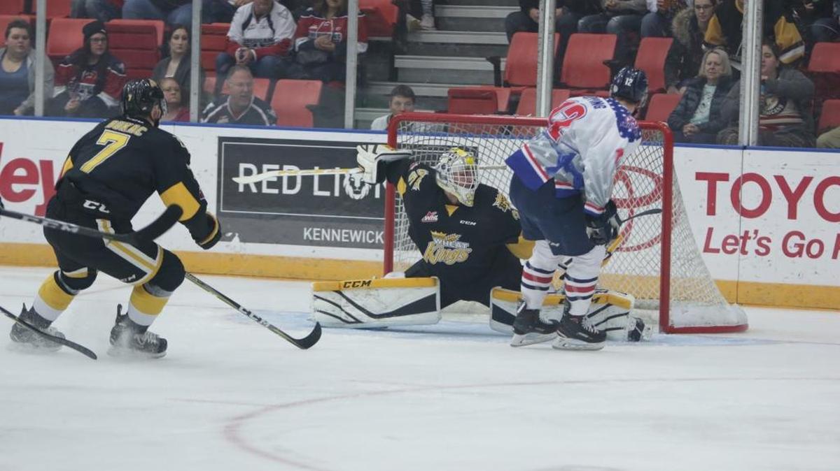 Brandon goalie Dylan Myskiw stops Tri-City’s Jordan Topping on a breakaway in the first period of Friday’s game. Topping had three goals in the American’s 4-3 overtime win.