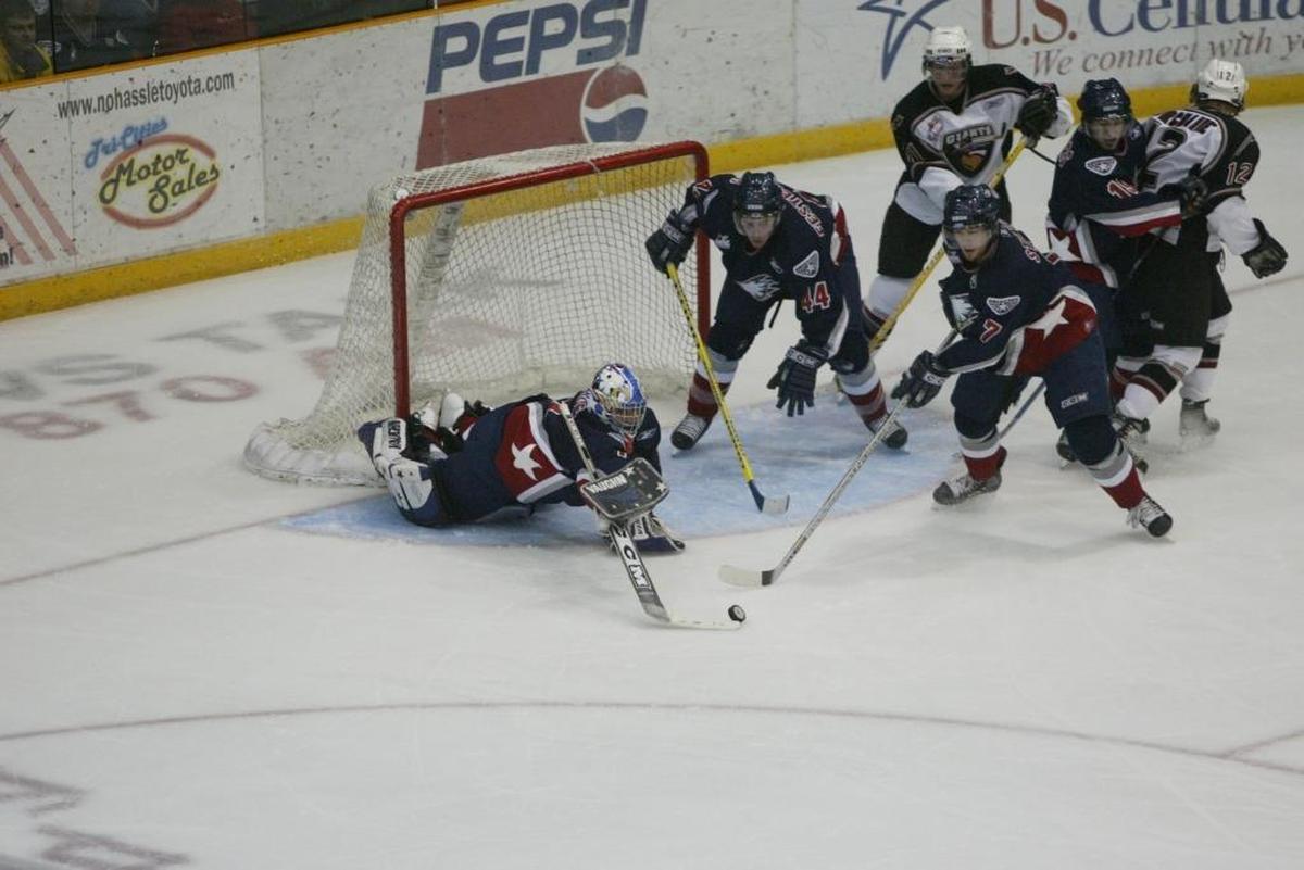 Tri-City Americans goalie Carey Price deflects the puck alongside teammates Brett Festerling (44) and Clayton Stoner (7) against Vancouver on Dec. 18, 2004, at Three Rivers Coliseum in Kennewick. Price recorded a shutout in the 6-0 victory.