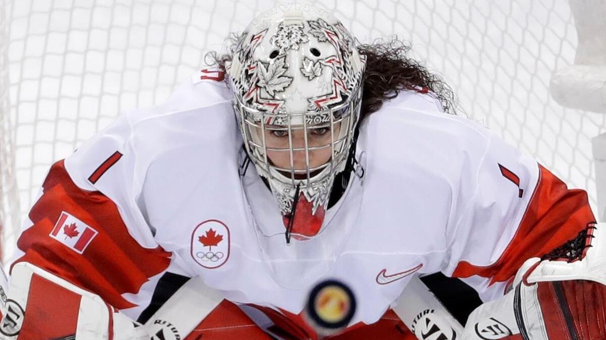 Canadian goalie Shannon Szabados stares at a flying puck during the second period of Thursday’s gold medal game against the United States at the 2018 Winter Olympics in Gangneung, South Korea.