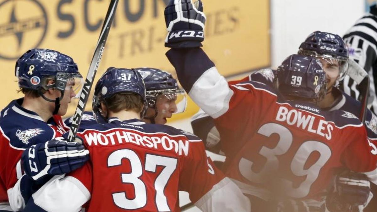 Parker Wotherspoon (37) and Parker Bowles (39) celebrate a goal by Brian Williams during last year’s New Year’s Even game against the Spokane Chiefs at Toyota Center. The two teams square off again in the annual matchup Thursday.