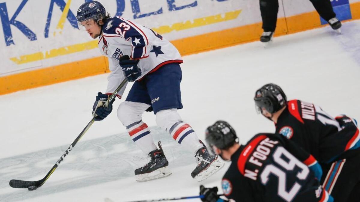 Tri-City’s Isaac Johnson (23) skates ahead of Kelowna’s Nolan Foote (29) and Dallon Wilton during Wednesday’s game in the first round of the WHL playoffs at Toyota Center. The Americans won 5-3 to take a 3-0 lead in the series.