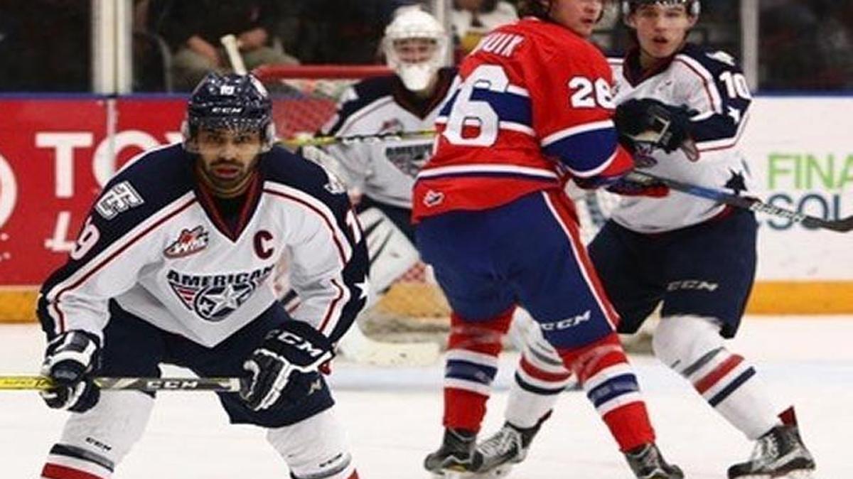 Tri-City’s Tyler Sandhu (19) defends against Spokane’s Kailer Yamamoto (17) during Saturday’s annual New Year’s Eve game between the teams. The Americans beat the Chiefs 3-1.