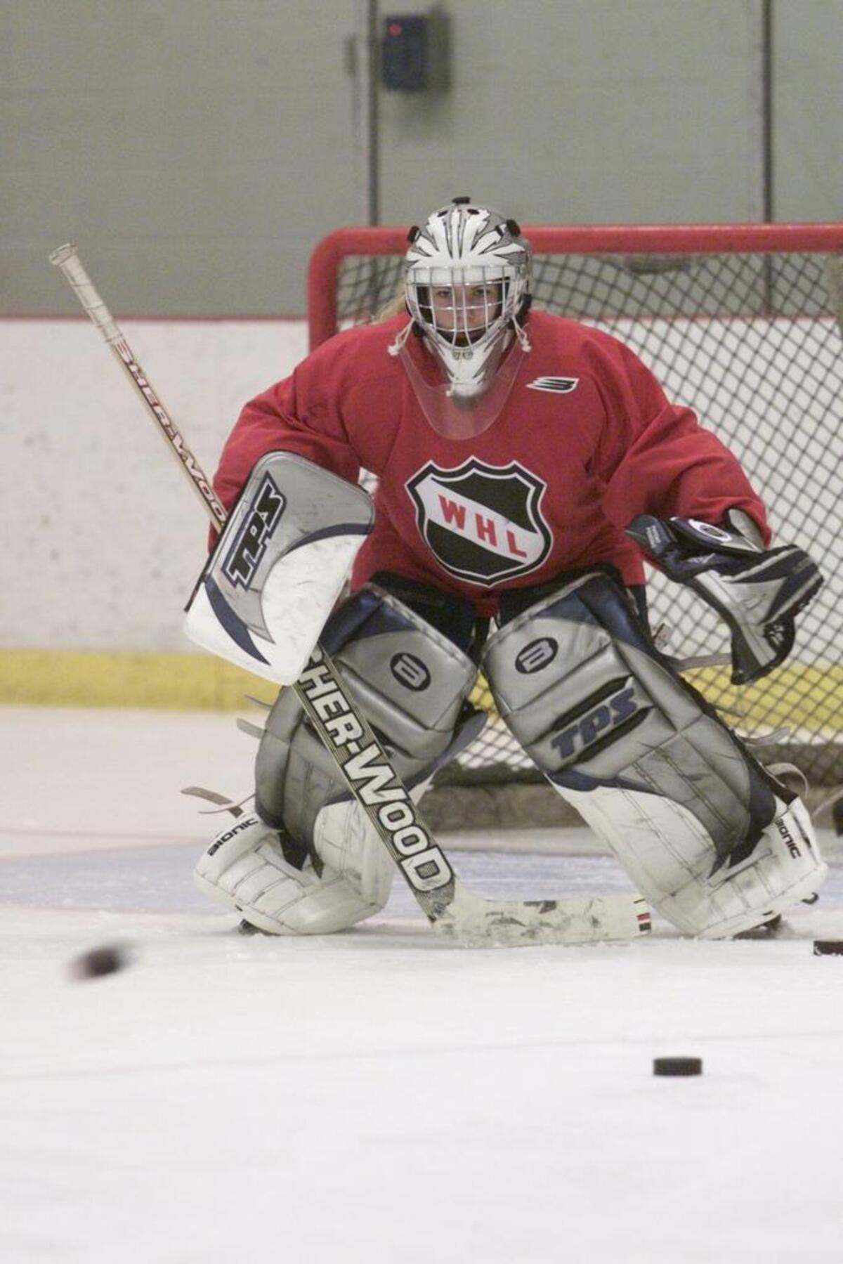 Shannon Szabados takes a turn in goal during a practice session for the Tri City Americans in 2002. The 16- year- old is from Edmonton, Alberta.