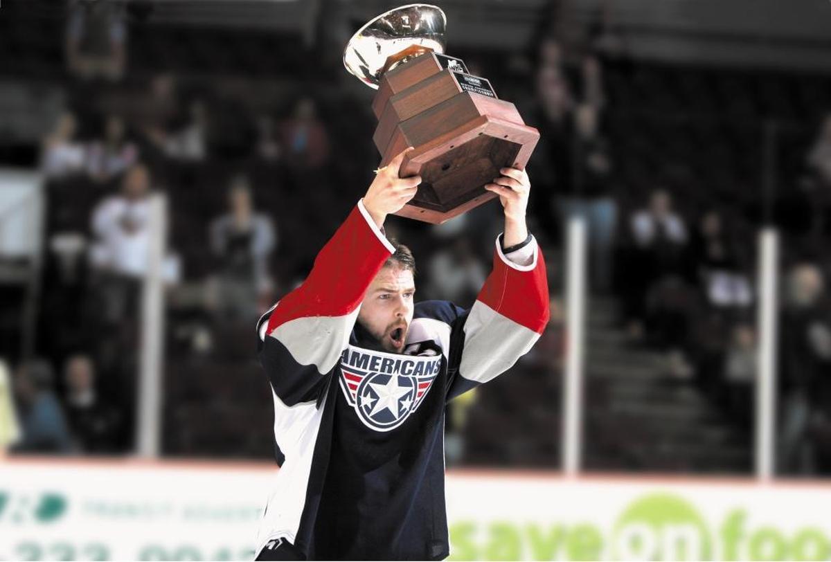 Tri-City Americans captain Jarrett Toll presents the 2010 Western Conference trophy to his teammates and the Tri-City fans. It was the first Western Conference title for the team.