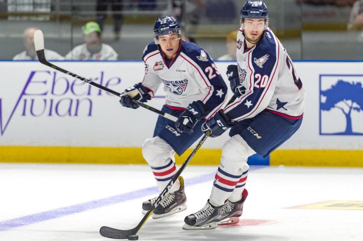 Tri-City’s Max James (20) moves the puck up ice Saturday against Seattle in the Western Hockey League opener for both teams. The Thunderbirds won 4-3.