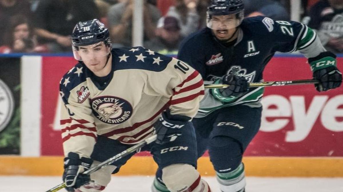 Tri City’s Dylan Coghlan is pursued by Seattle’s Keegan Kolesar during the second period of Friday’s playoff game.