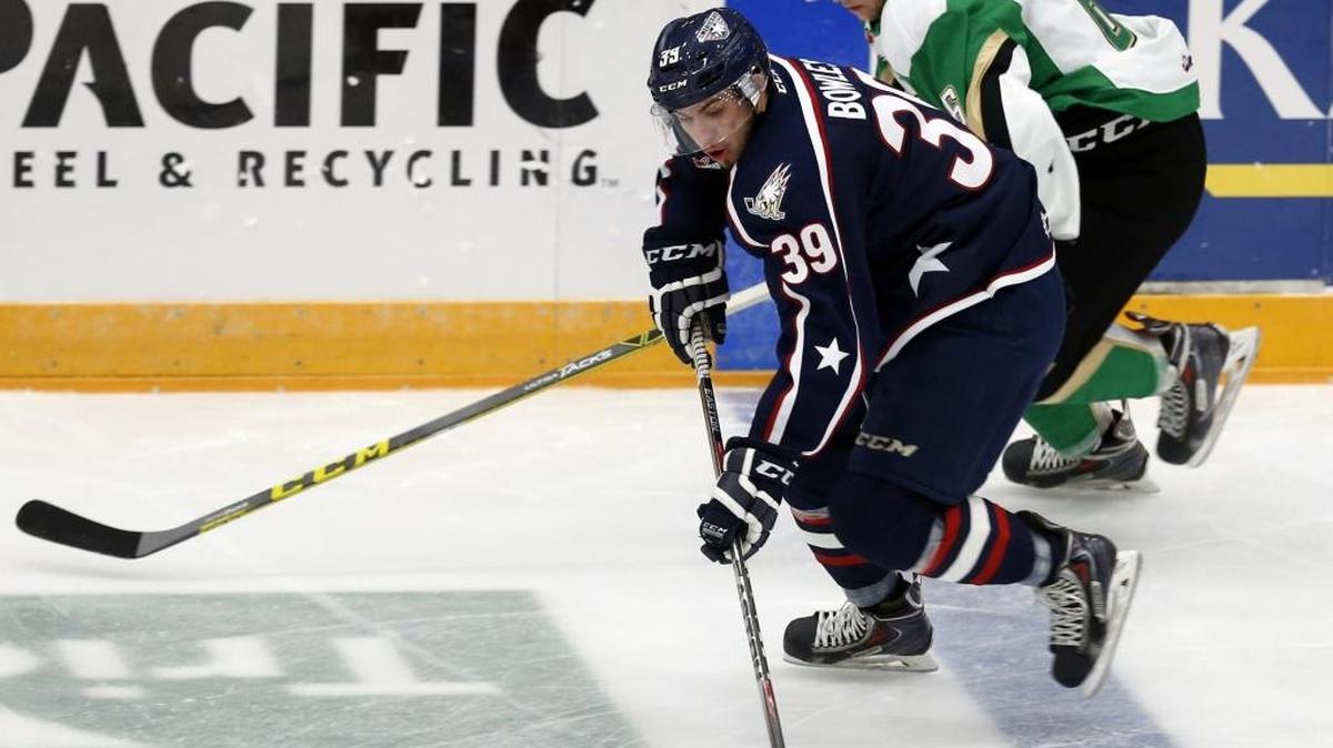 
Tri-City’s Parker Bowles (39) controls the puck as he skates past Prince Albert’s Vojtech Budik on Wednesday night at Toyota Center in Kennewick.

