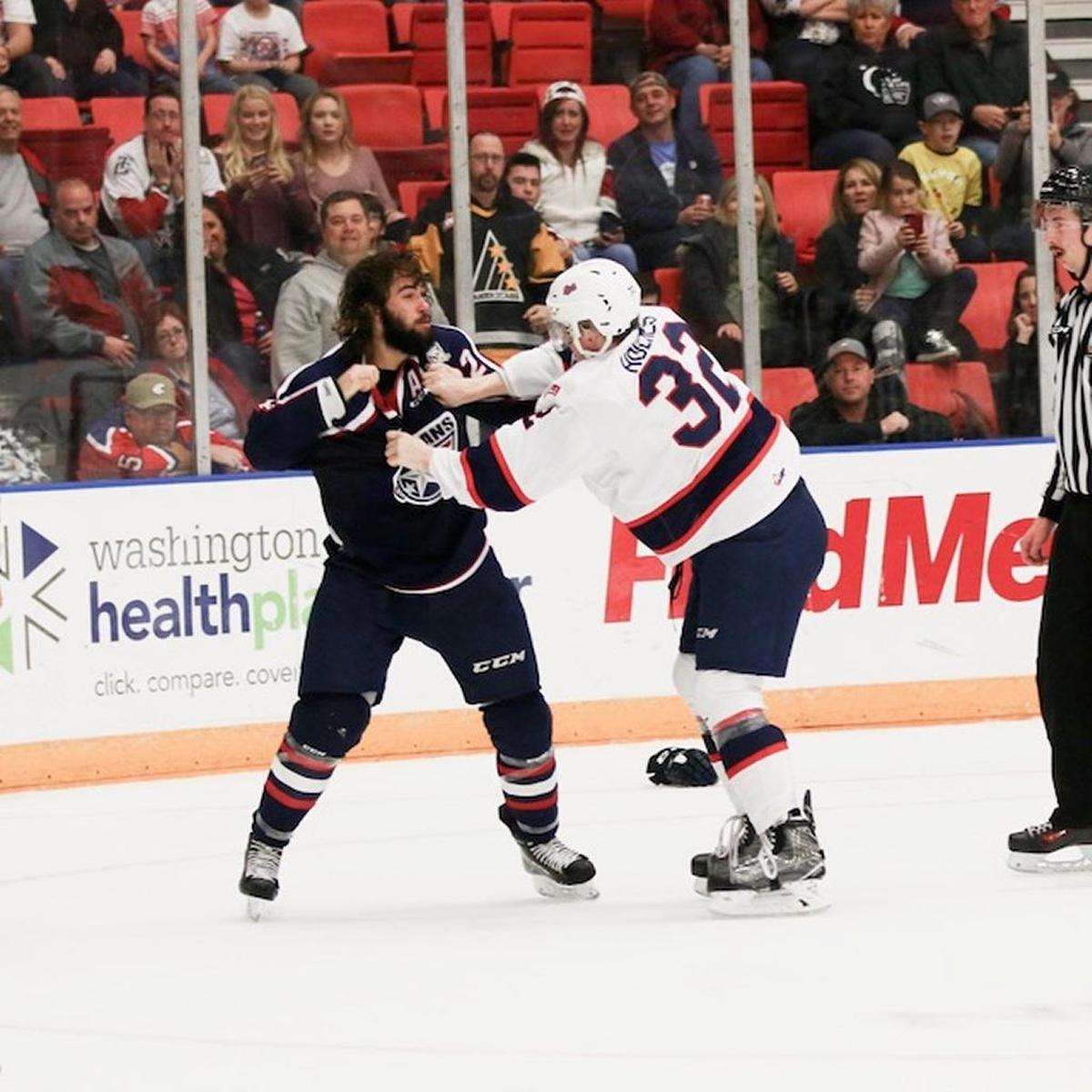 Tri-City’s Nolan Yaremko (left) fights Regina’s Robbie Holmes during the first period of Friday’s game at Toyota Center. The Americans beat the Pats 6-0.