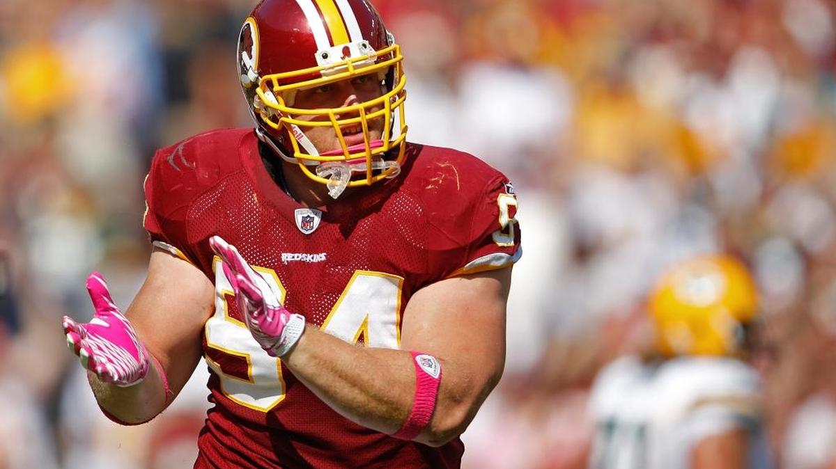 Washington Redskins defensive end Adam Carriker celebrates after a play during the first half of a 2010 game against the Green Bay Packers in Landover, Md.