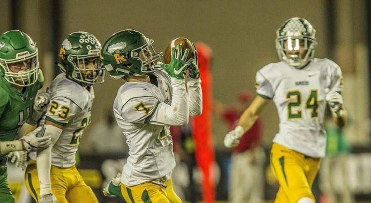 Richland defensive back Adam Weissenfels (7) intercepts a pass with less than 2 minutes left to seal the victory for the Bombers in the Woodinville Falcons and Richland Bombers 4A Washington state football championship game in the Tacoma Dome Saturday, Dec. 2, 2017. It was one of Weissenfels’ three interceptions on the day.