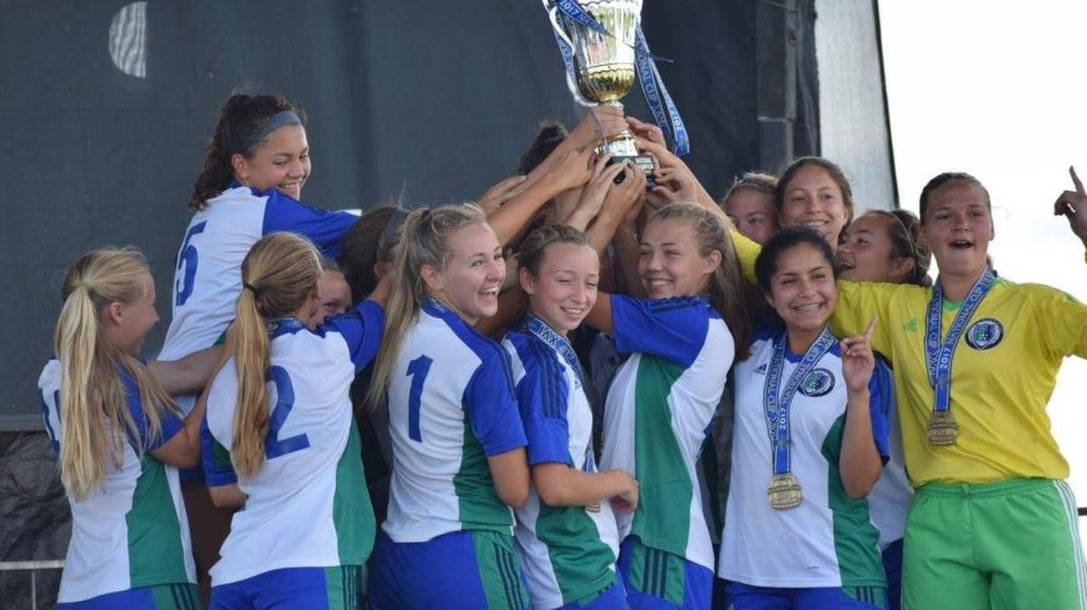 The Academy of Soccer Excellence 01 Girls Emerald team was all smiles after winning the National Premier Cup on Monday in Westfield, Ind.