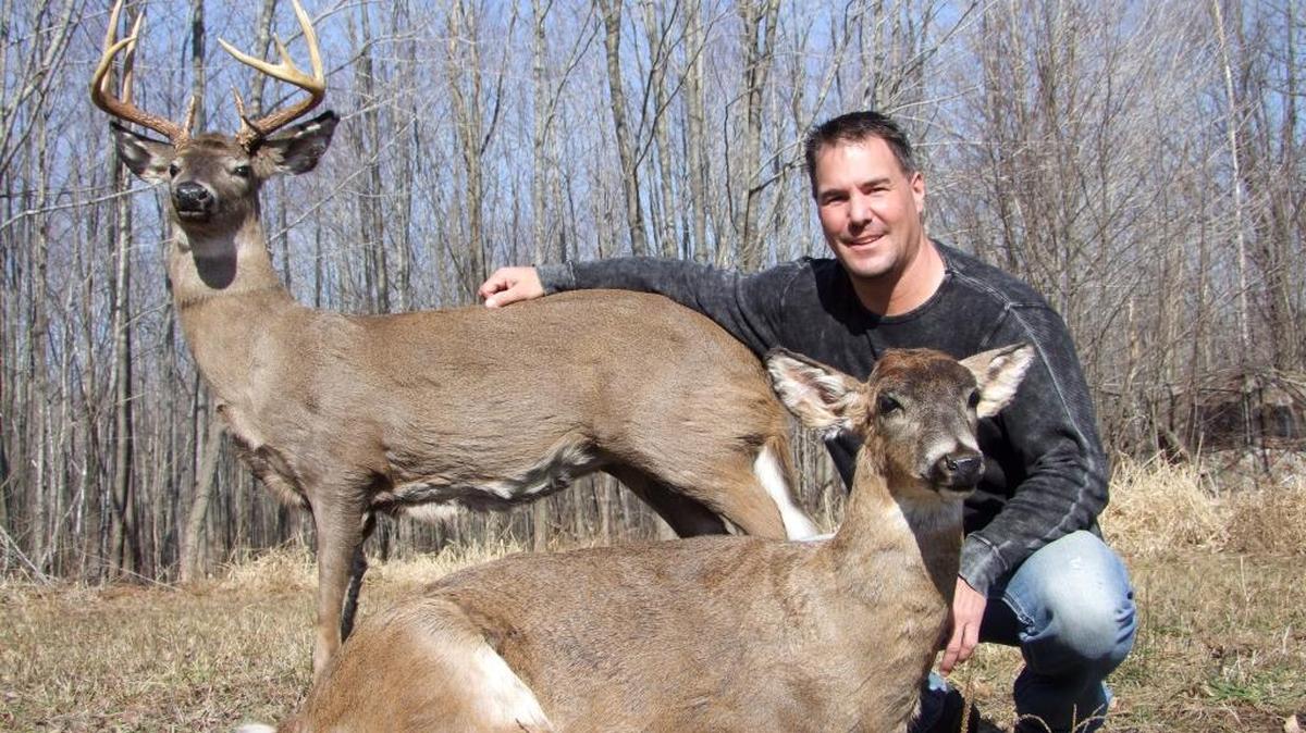 Brian Wolslegel with two of his creations; demand for wildlife robots is huge, says Jim Reed of the Humane Society Wildlife Land Trust, which donates them to anti-poaching agencies.